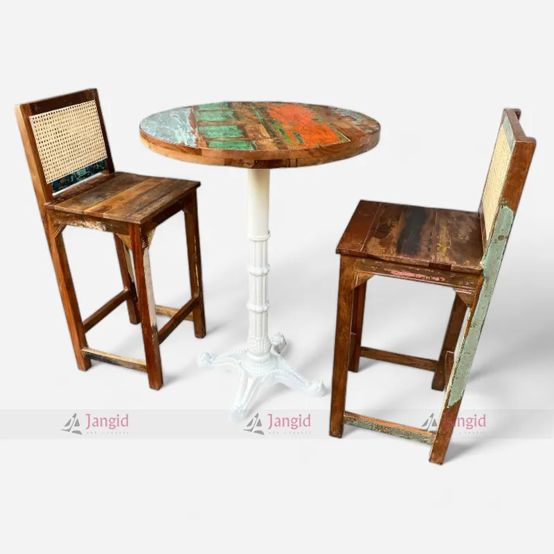 Reclaimed wood bar table and two chairs featuring cane work and circular table top